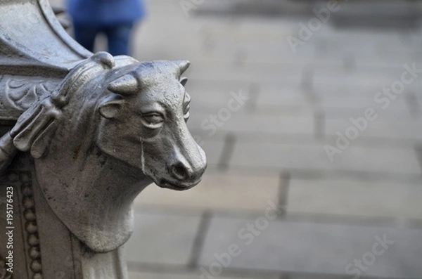 Fototapeta Turin, Italy, Piedmont, December 8 2017. Detail of the lamp posts of Piazza Castello, adorned with one of the symbols of Turin: the bull, we can also see it in the typical Torinese fountains.