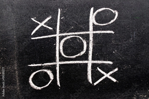 Fototapeta White color hand drawing as tic tac toe game shape on blackboard background