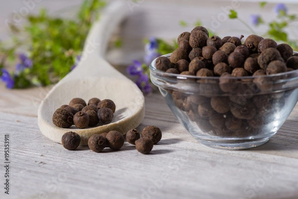 Obraz Close up on spoon with allspice (pimento)