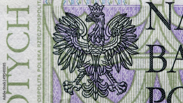 Obraz Close up on national emblem eagle of new Polish banknotes hundred zloty