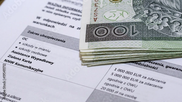 Obraz stack of money deposited for car insurance