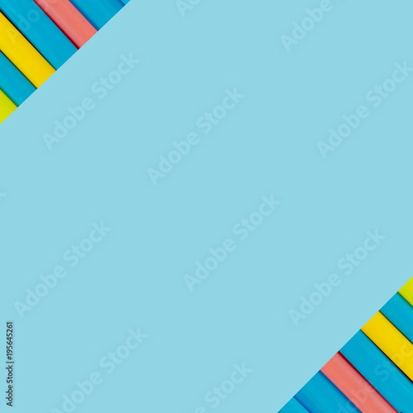 Obraz multi  Colorful pipe with copy space for your text on blue background. / education, creativity and feeling happy