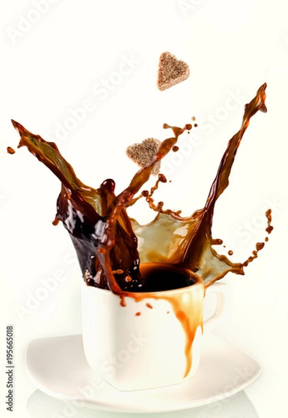 Fototapeta Sugar heart being dropped into coffee creating splash