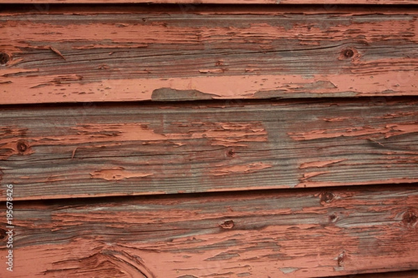 Obraz Flaking, red paint on an old wooden wall
