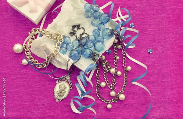 Fototapeta The decorative composition is Packed in a gifts box for women.
