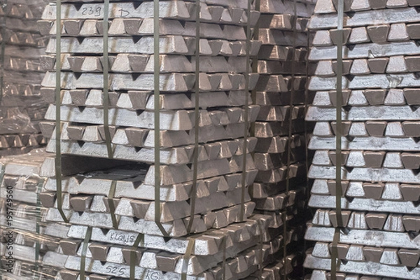 Obraz Close up of Aluminum on pallet Ingot storage in indoor warehouse for export as industrial background. Aluminium bullion on pallet