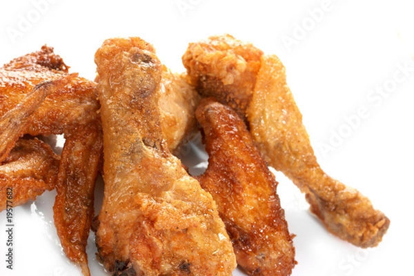 Fototapeta Chicken legs on the white