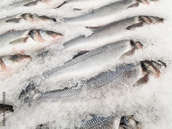 Obraz Fresh fish on ice in a supermarket for sale.