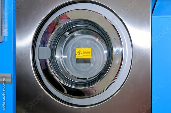 Fototapeta Round loading hatch of the industrial washing machine
