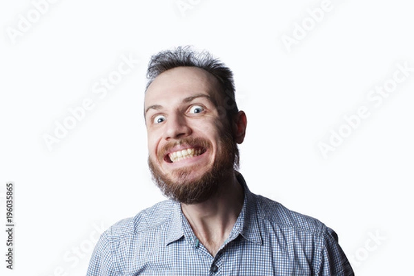 Fototapeta expression and people concept - man with funny face over white background