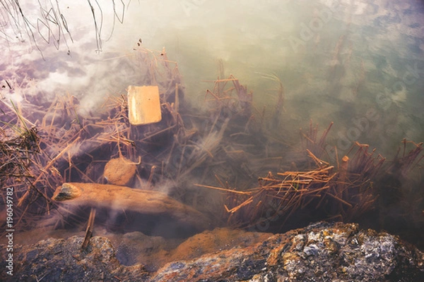 Fototapeta Sulfurous lake near an old mining area on the island of Elba in Italy