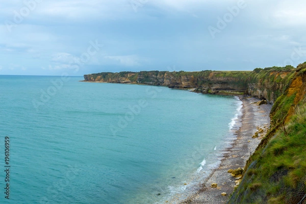 Fototapeta Second World War WWII, The Pointe du Hoc was the highest point between Utah Beach and Omaha Beach. On D-Day the US Army assaulted and captured Pointe du Hoc after scaling the cliffs.