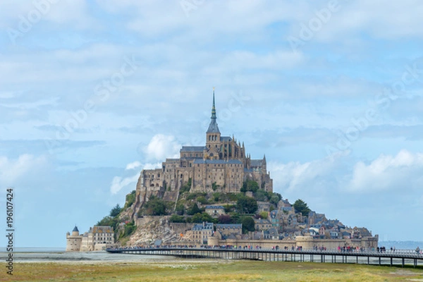 Fototapeta Panoramic view of famous Le Mont Saint-Michel tidal island in beautiful twilight during grey blue hour at dusk, Normandy, northern France