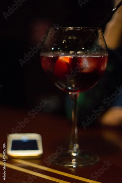 Fototapeta Pouring red wine into the glass