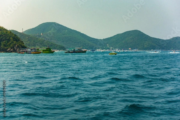 Fototapeta boats on sea and mountain on island. sea in thailand is one popular location of traveller in summer.
