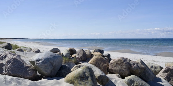 Obraz Laesoe / Denmark: Boulders at a beach access in Vesteroe Havn on a sunny day in April