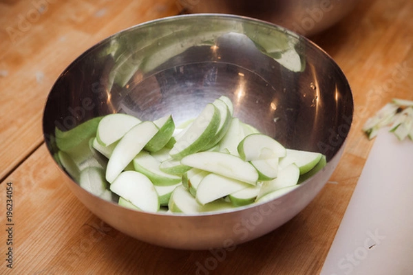 Obraz Apples sliced on wood table
