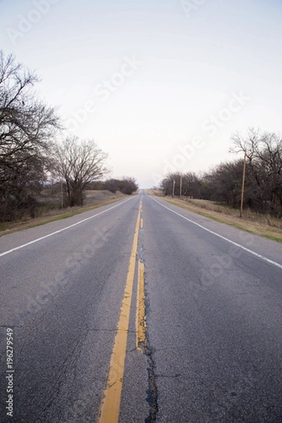 Fototapeta The Wide Open Road - A highway in the country