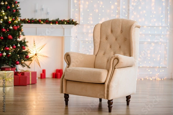 Obraz Christmas Tree and Christmas gift boxes in the interior with a fireplace.