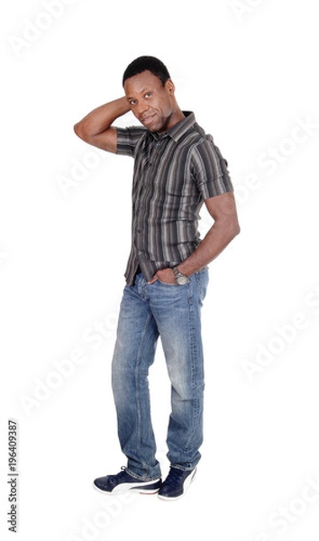 Fototapeta Disappointed looking African man standing