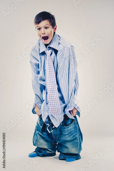 Obraz funny boy wearing Dad's clothes