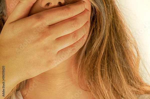 Fototapeta man silences a woman