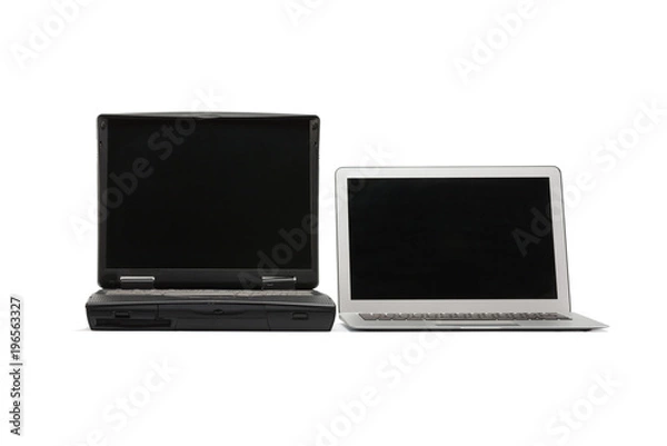 Fototapeta Comparing of laptops, new modern and old laptop, present and past