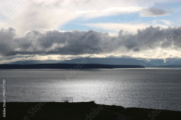 Obraz Sun setting over the ocean