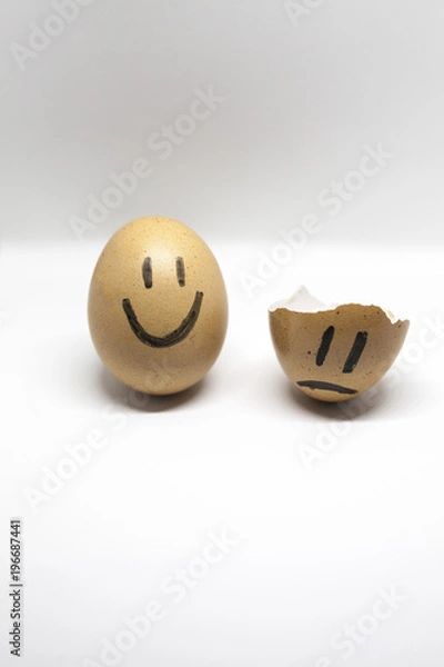 Obraz Story of broken heart written by the shells of eggs on the white background