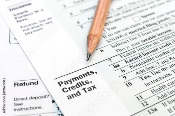 Obraz Pencil on the tax form. Close up. Business concept.