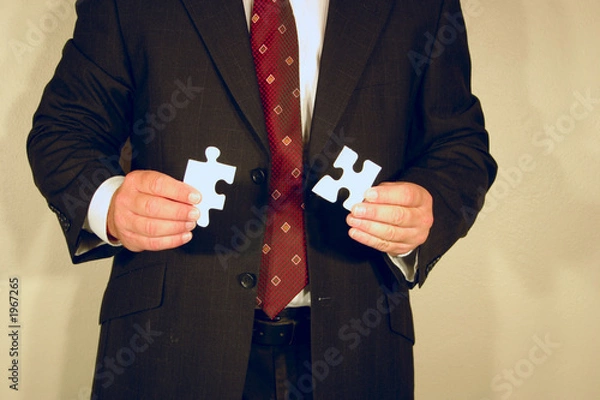 Fototapeta man with jigsaw puzzle