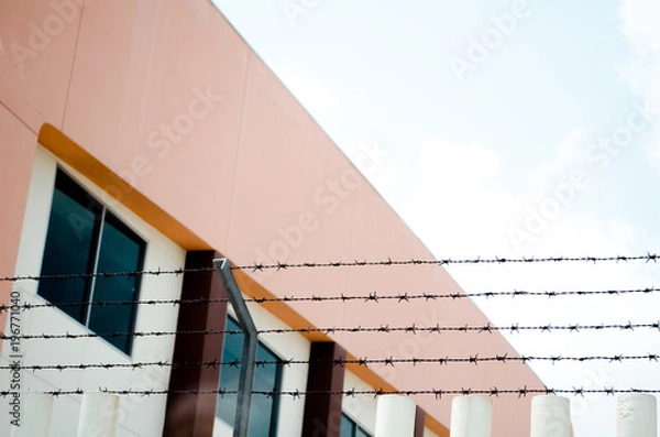 Obraz barbed wire wall and sky background