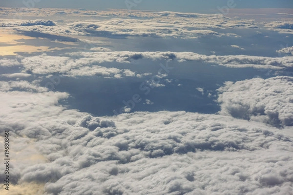 Fototapeta Beautiful clouds from above aircraft