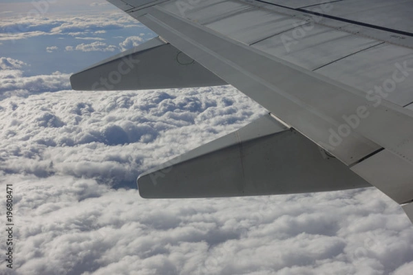 Obraz Plane wing from inside aircraft