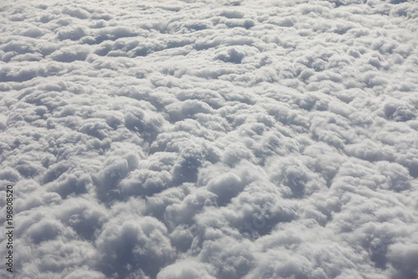 Fototapeta Clouds from above airplane view