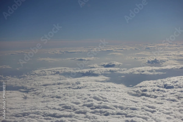 Fototapeta Clouds from above airplane view