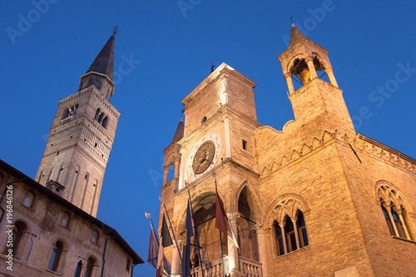 Obraz pordenone, town hall and Saint Mark bell tower in the evening
