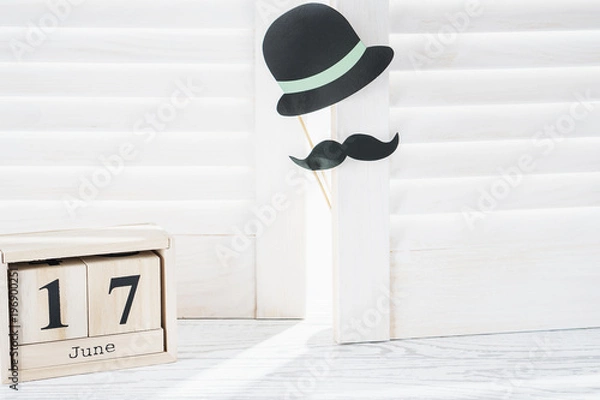 Fototapeta Happy Father's day background with copy space. Black hat and mustache, father's day, 17 June 2018