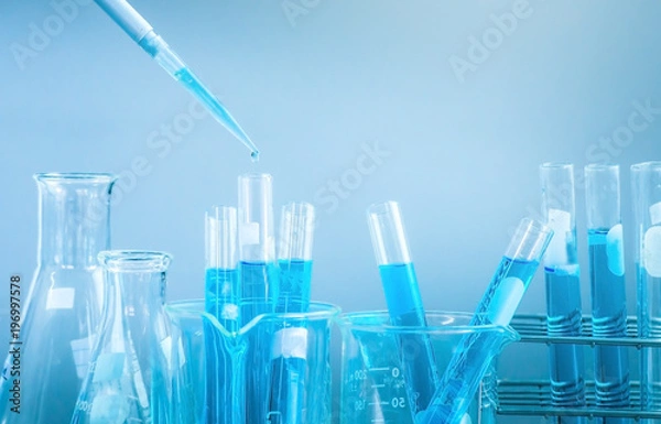 Fototapeta Test tubes closeup, science laboratory research and development concept