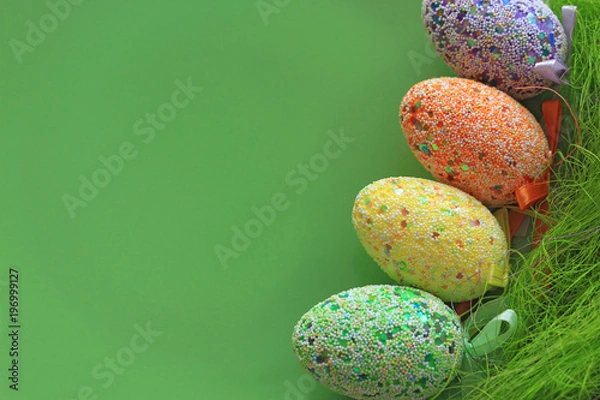 Obraz Easter eggs decoration on green background