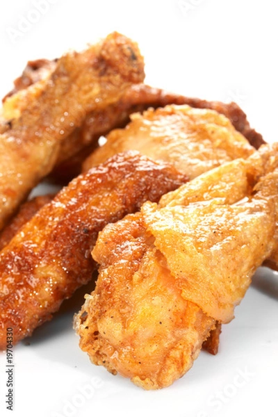 Fototapeta Chicken legs on the white