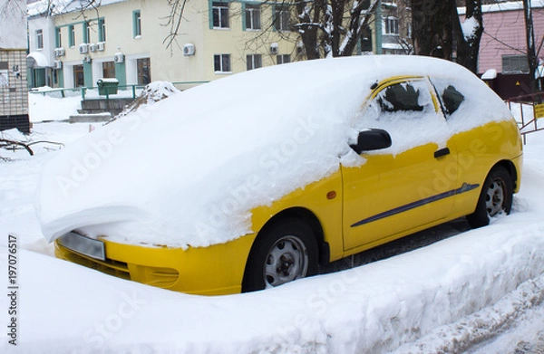 Fototapeta Car covered with snow