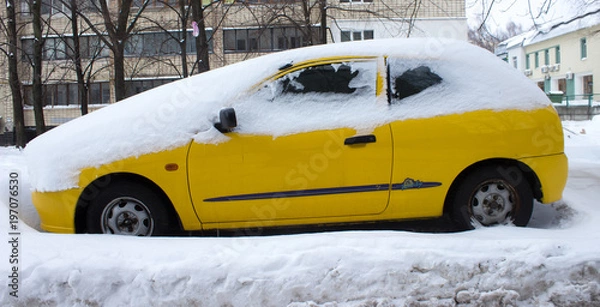 Fototapeta Car covered with snow