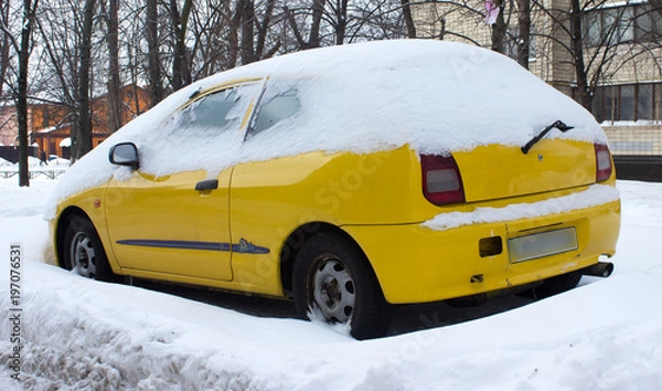 Fototapeta Car covered with snow