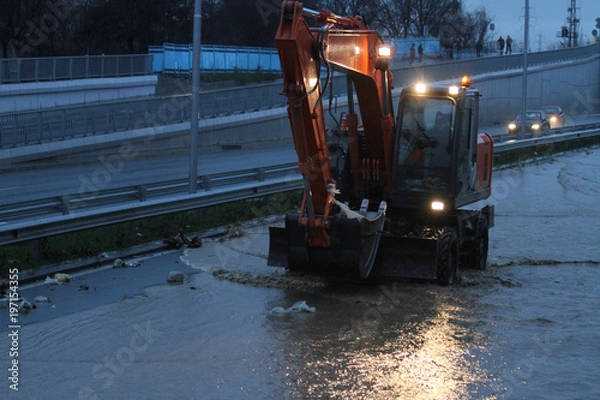 Fototapeta Large flood happens because of the poor construction, lack of drainage , the felling of the trees, destroying the nature and worsening climatic changes due to global pollution from people. 