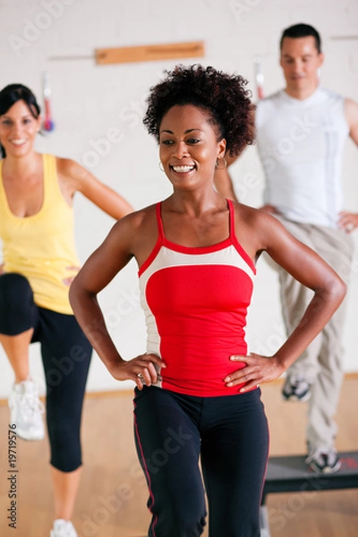 Fototapeta Step Training in gym with instructor