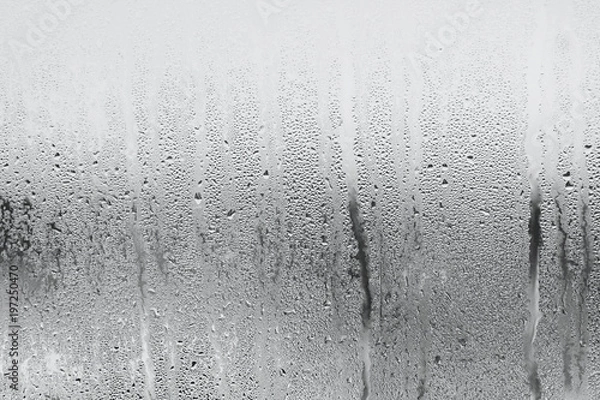 Obraz Blue background of natural water condensation, window glass with high air strong humidity, large drops drip. Collecting and streaming down