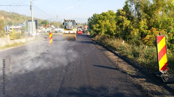 Fototapeta Road construction machinery in activity