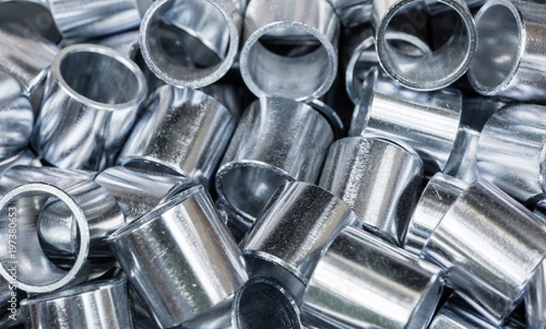 Fototapeta Steel sleeve. Details made lathe. Obtained on a lathe from steel and cast iron. Galvanized, coated part for anti-corrosion. 