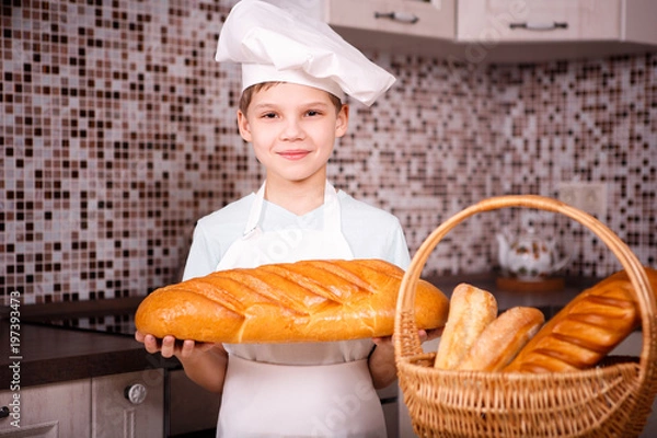 Fototapeta The boy with the bread